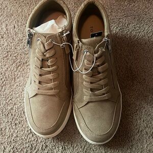 These came from Torrid a size 12w tan never worn blk wore once.